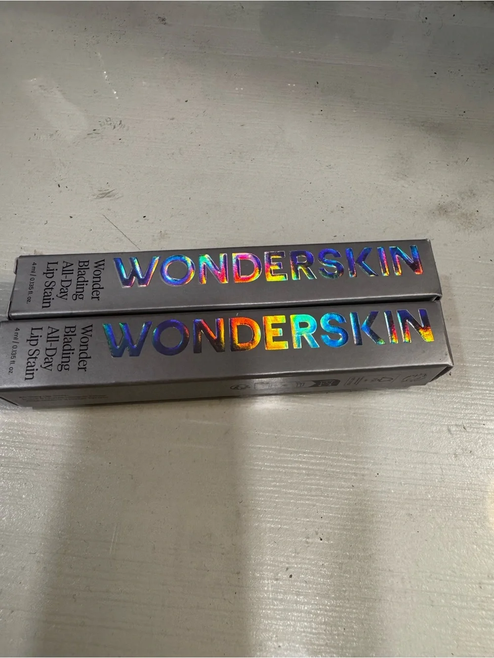 Wonderskin Wonder Blading All-Day Lip Stain - Iridescent Silver Packaging
